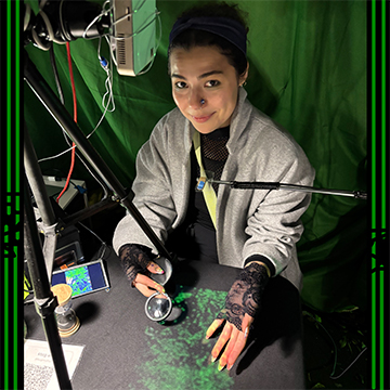 indigo coiyle digital medium doing a palm reading